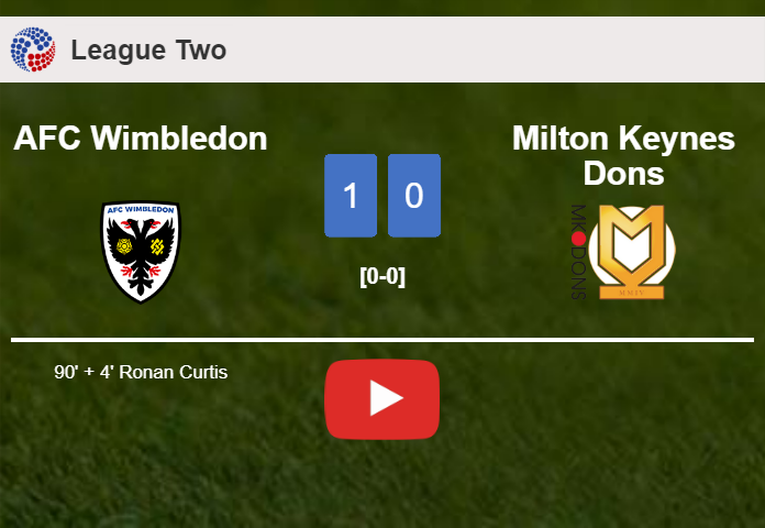AFC Wimbledon conquers Milton Keynes Dons 1-0 with a late goal scored by R. Curtis. HIGHLIGHTS